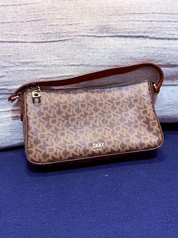 DKNY brown monogram wristlet/shoulder bag