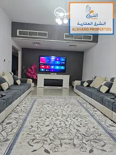 Furnished 2-bedroom apartment with a living room for annual rent at Horizon Towers, Al Rashidiya 1 A