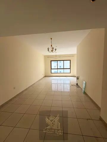 A spacious two-bedroom apartment is available for annual rent in Al Majaz 3, near Al Qasba, in a prime location close to various services and faciliti
