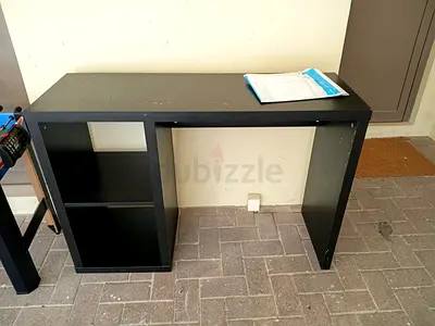 Simple black desk with built-in shelving - good condition