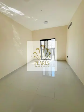A spacious 1-bedroom apartment with a large rooftop is available for annual rent in Al Jurf 3, Ajman. The apartment is located in a completely new bui