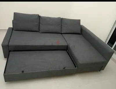 Grey L-shaped Sofa Bed with Storage — Good Condition