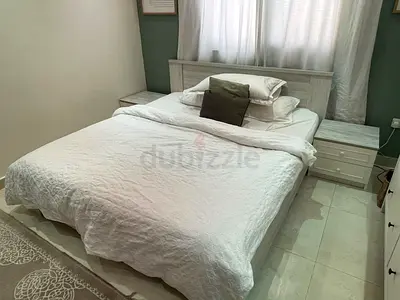 King Size bed and two night stands