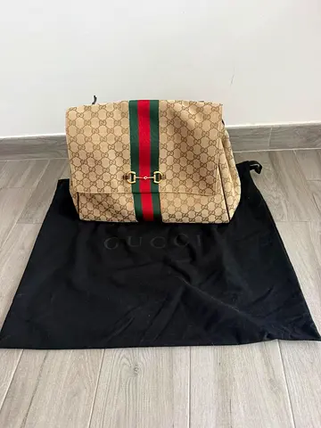 Gucci paparazzo large top handle bag