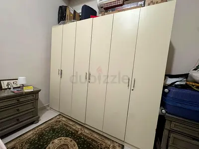6-door freestanding wardrobe / armoire in good condition wooden strong and good quality