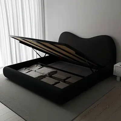 Black storage double bed with hydraulic lift — good condition