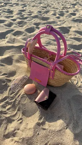 Jacquemus Small straw basket bag with pink leather trim and long strap