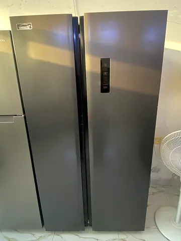Large double-door refrigerator in dark steel finish - good condition