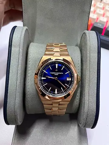 Vacheron Constantin Overseas features a striking sunburst blue lacquered dial that beautifully contr