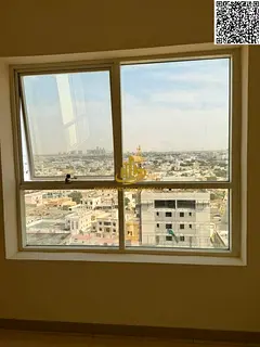 Best price in Ajman: a spacious 2-bedroom apartment with a living room, a completely unobstructed vi