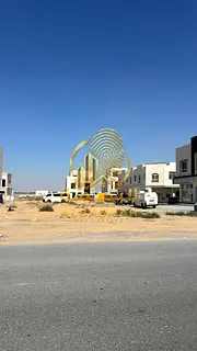 Residential land for sale in Al-Hoshi (Sharjah – Al-Badi’ Suburb), next to the mosque.