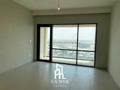 Waterfront 1BR Apartment | Balcony | Creek & City View