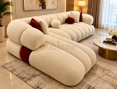 L shaped Curved Ivory Bouclé 3-Seater Sofa with Red Accent Cushions