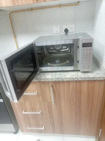 Used Silver Panasonic Microwave Oven - Good Working Condition