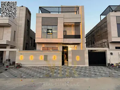 A dream villa in Al Helio, Ajman, featuring an elegant design, high-end finishes, and a location cl