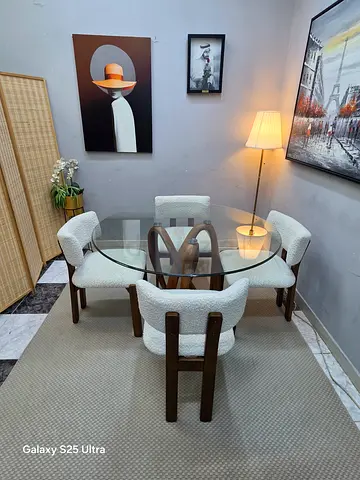 Glass top round dining table with 4 upholstered chairs - good condition