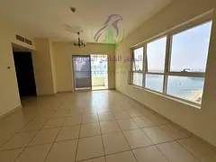 Luxury 2BHK in Al Khan with 2 balconies, direct sea view, 4 bathrooms, 2 master bedrooms, maid’s r
