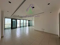 Spacious 3-bedroom, 5-bath apartment with large terrace, open views, maid's room, laundry, gym, pool