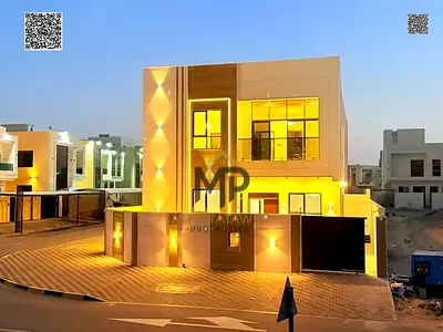 A luxurious corner villa for sale in Al Amerah, Ajman—situated at the intersection of two streets w