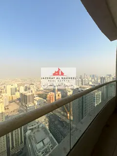 Two-bedroom apartment with a living room for sale in the Al Khan area, Sharjah. Features an open vie
