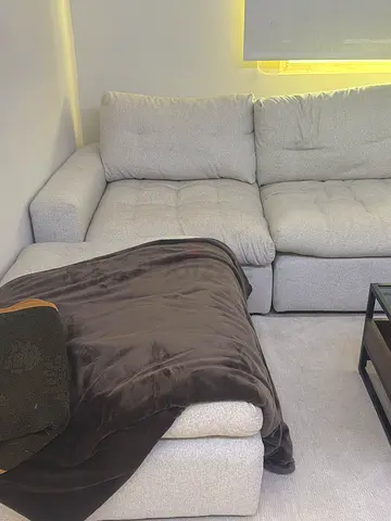 Light grey 3-seater corner sofa in good condition