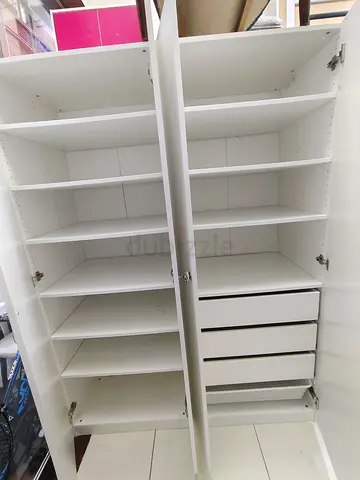 White Double Wardrobe with Multiple Shelves and Drawers - Good Condition