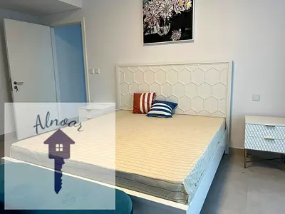 LAVISH TWO BEDROOM APARTMENT IS AVAILABLE FOR RENT IN ALJADA SHARJAH WITH POOL AND PARKING ALSO
