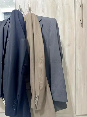Three set men's suit — black, brown, and grey, good condition