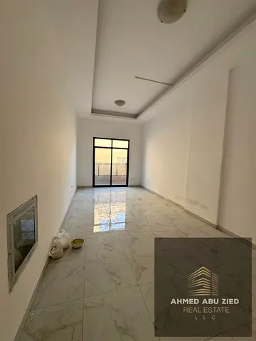 Two bedrooms (including a master bedroom), a large living area, a balcony with an open view, centra