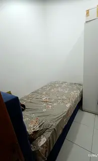 Cozy room near Al Ghobaiba metro in a family apartment