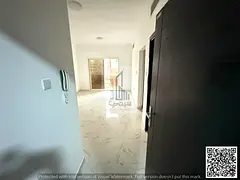 Two bedrooms and a living room in Al-Aliya