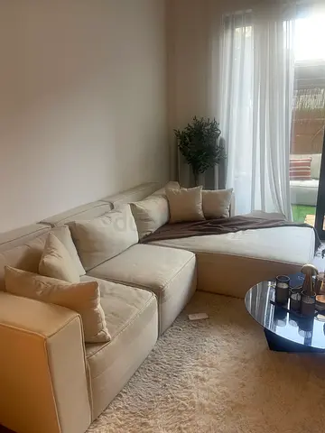 Light beige 3-seater fabric sofa in good condition