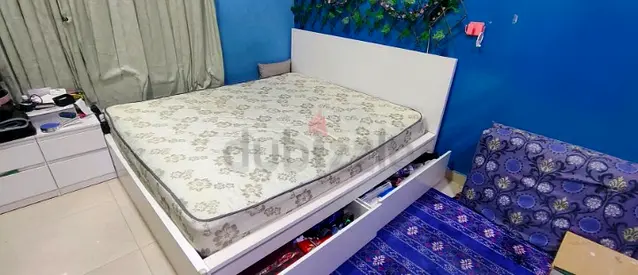 Ikea king size bed with mattress and storage drawers