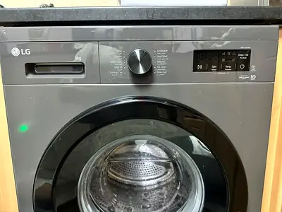 Very less used LG 9KG Front Load Automatic washing machine