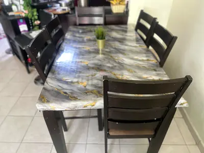 6-seater wooden dining table and 6 chairs