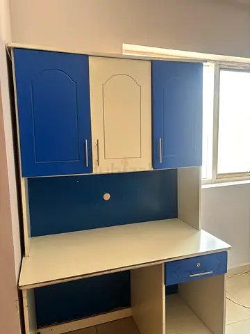 White and blue wardrobe / cabinet with multiple compartments