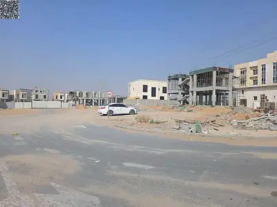 Corner residential plot for sale, 4,200 sq. ft., in a prime location in Al Helio 2.