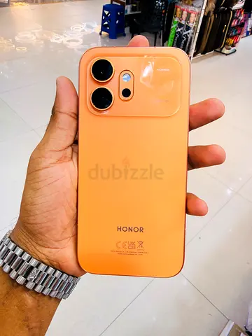 Honor smartphone in peach — good condition, unlocked