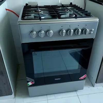 Haier 4-Burner Gas Cooker with Oven - Good Working Condition