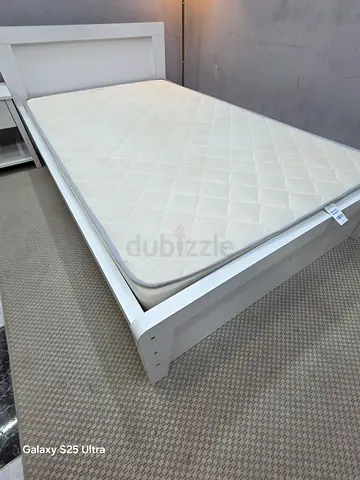 White wooden double bed frame with mattress - good condition