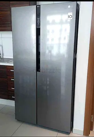 LG Side-by-Side Refrigerator - Stainless Steel, Good Condition
