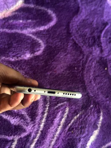Used iPhone (silver) - good working condition, minor wear