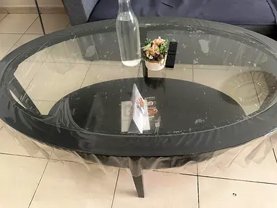 Glass Oval Coffee Table with Black Frame - Good Used Condition