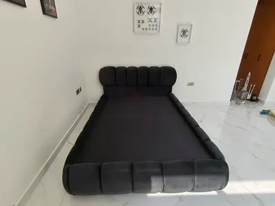 Dark grey upholstered platform bed frame - double/queen size