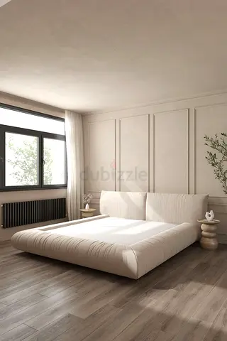 Low platform double bed with upholstered headboard - modern beige
