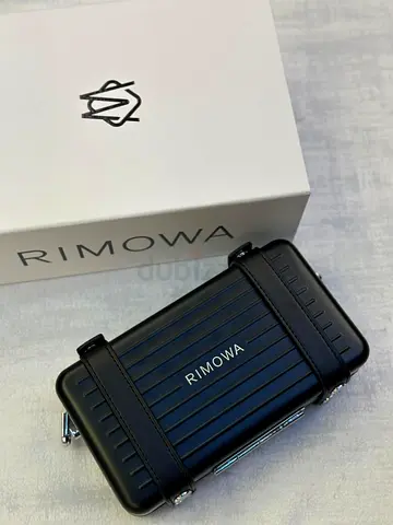 RIMOWA polycarbonate cross body