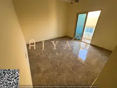 Annual rent in Ajman, Al Rawda 1: 1BR with balcony, storage, central AC, near Sheikh Mohammed Bin Za