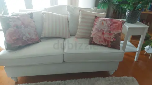 Elegant Cream 3-seater sofa with floral cushion set
