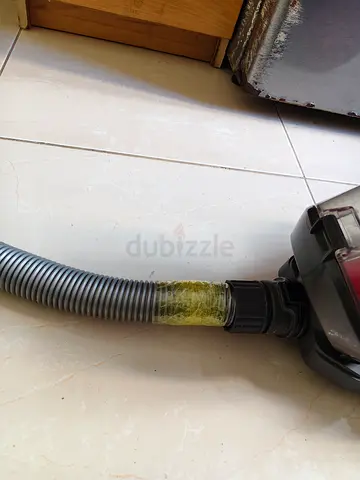 Used vacuum cleaner hose and canister - working, taped repair