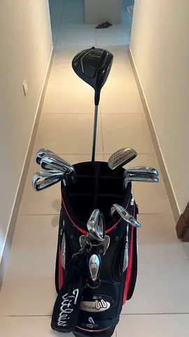 Complete set of golf clubs with bag — used, good condition. TitleistAP2